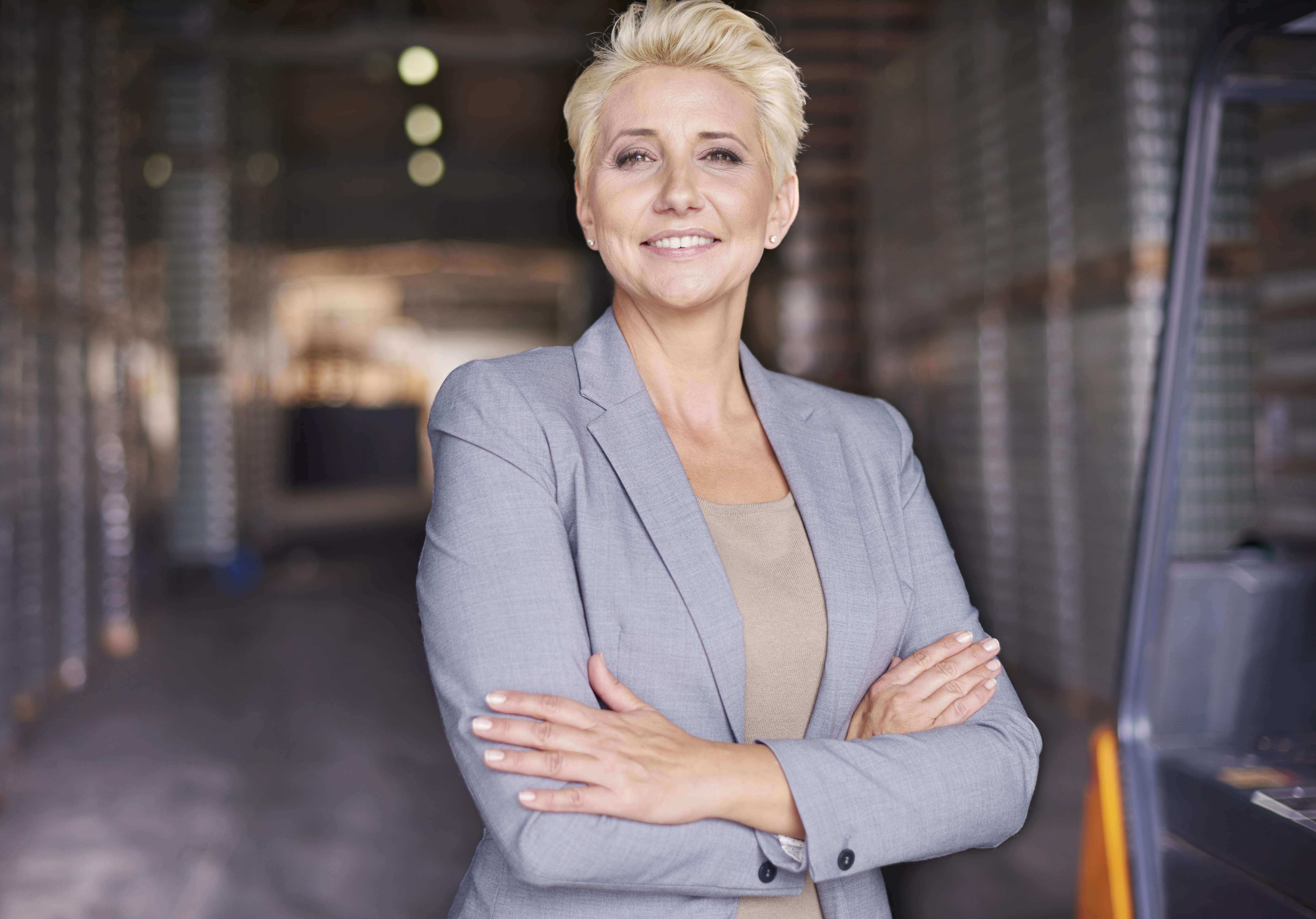 A woman in a business suit in an office